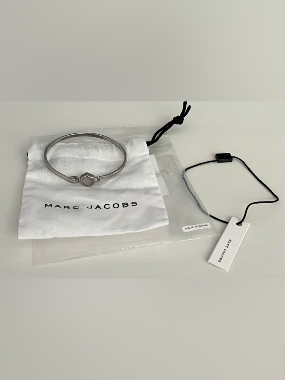 Marc Jacobs Silver Tonal Logo Bangle Bracelet